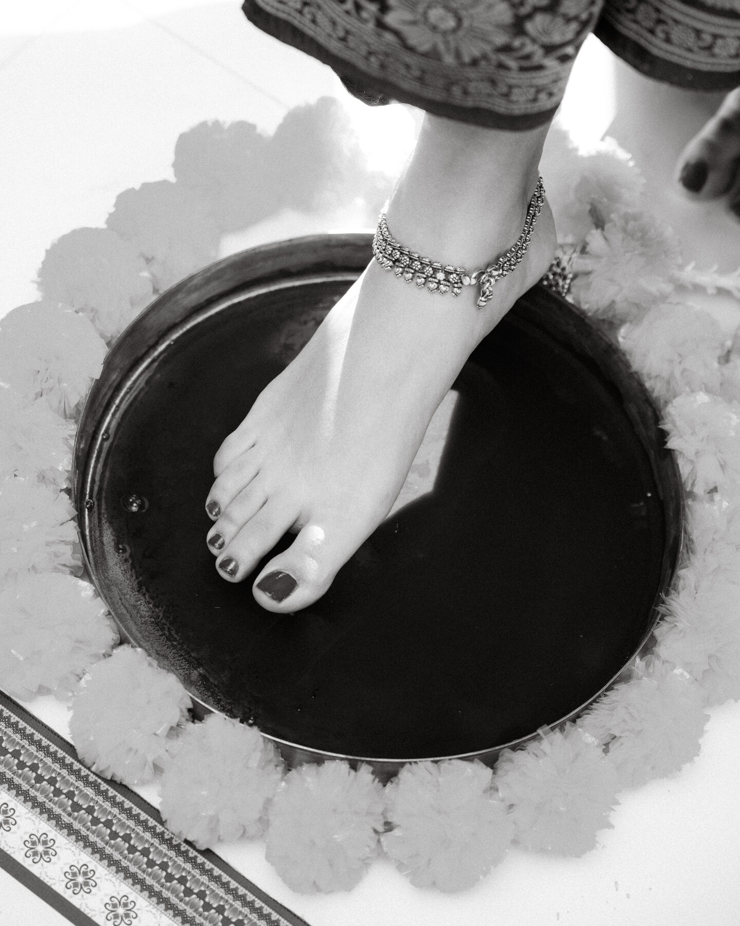 Gradient — anklet and ritual detail, cultural ceremony
